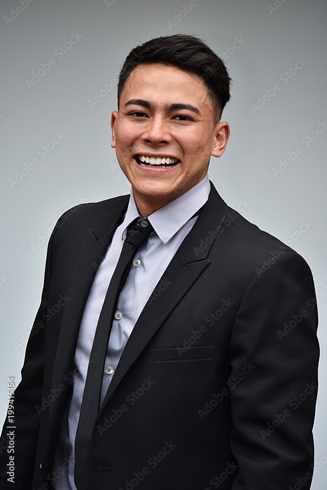 Smiling Latino Business Man Wearing Suit And Tie Smiling Latino Business Man Wearing Suit And Tie