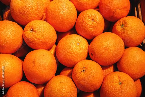 bright orange juicy oranges closeup top view photo