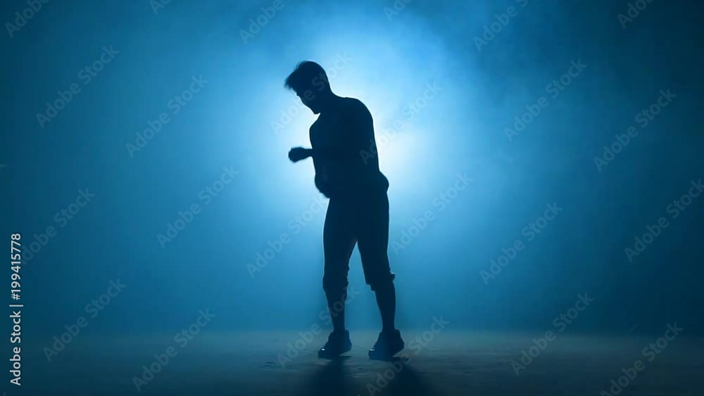 Teenager in casual clothers improvising in dance outdoor. King making up movements. Creative skills. Teenager in casual clothers improvising in dance outdoor. King making up movements. Creative skills.