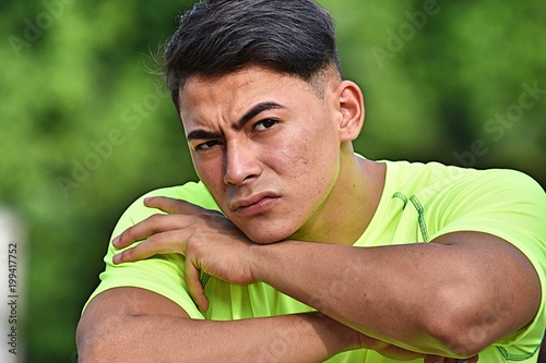 Unemotional Adult Male Athlete photo