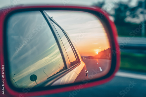 Sunset reflection in the rear view mirror © dvoevnore