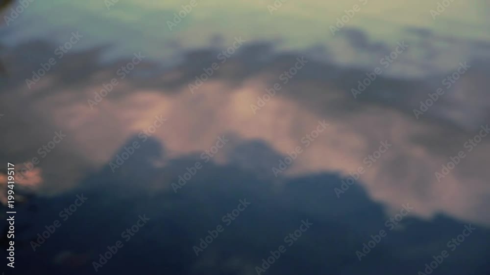 Rippling Lake Water with a Reflection of Clouds. Soft Focus Rippling Lake Water with a Reflection of Clouds. Soft Focus
