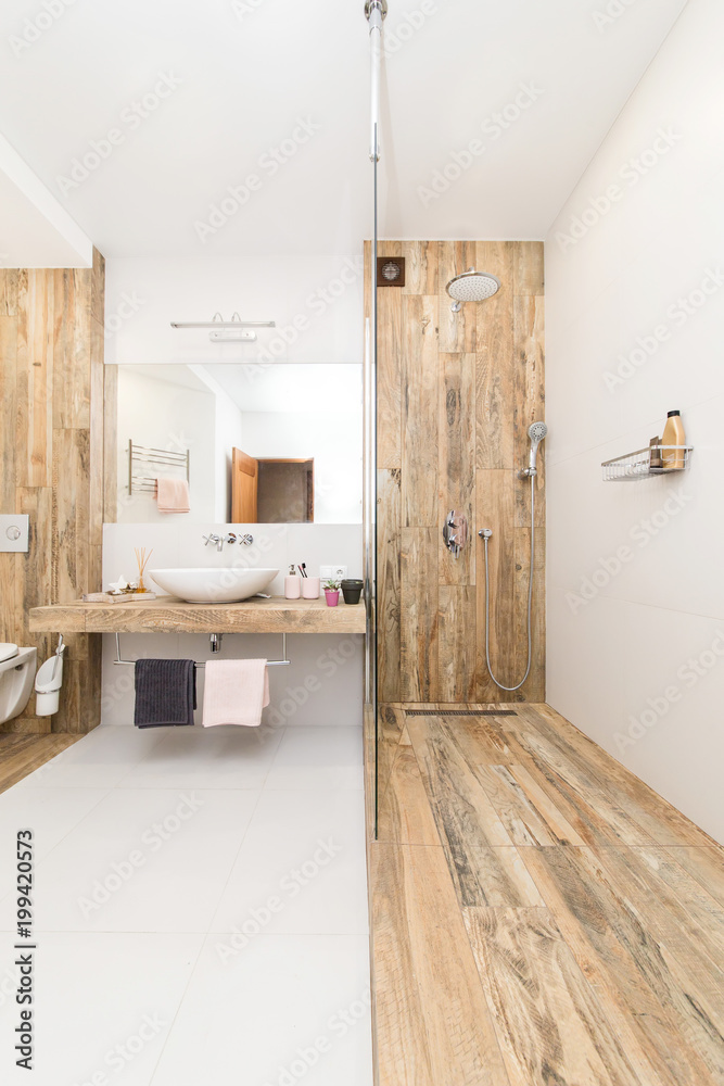 Modern Interior Of The Bathroom The Shower Compartment Is Covered With modern-interior-of-the-bathroom-the-shower-compartment-is-covered-with