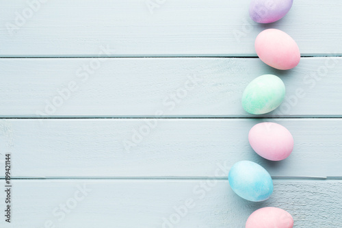 Pastel Easter eggs background. Spring greating card.