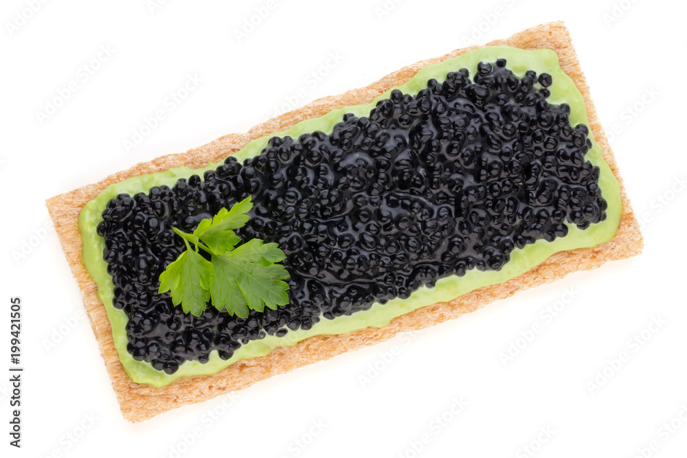 Canapes with black sturgeon caviar and spice isolated on the white background. Canapes with black sturgeon caviar and spice isolated on the white background.