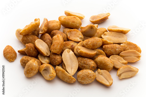 Peeled peanuts on the isolated background.