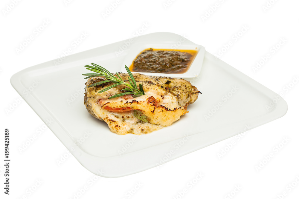 Roasted chicken breast with cheese and rosemary herb on white plate isolated
