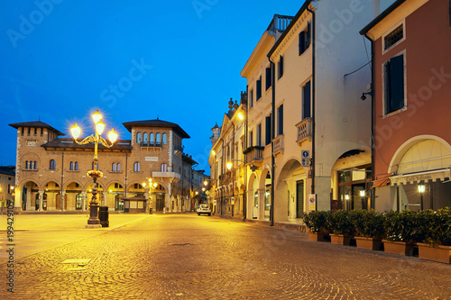 Montagnana, Italy - August 25, 2017: Night illumination of the main square of the commune.