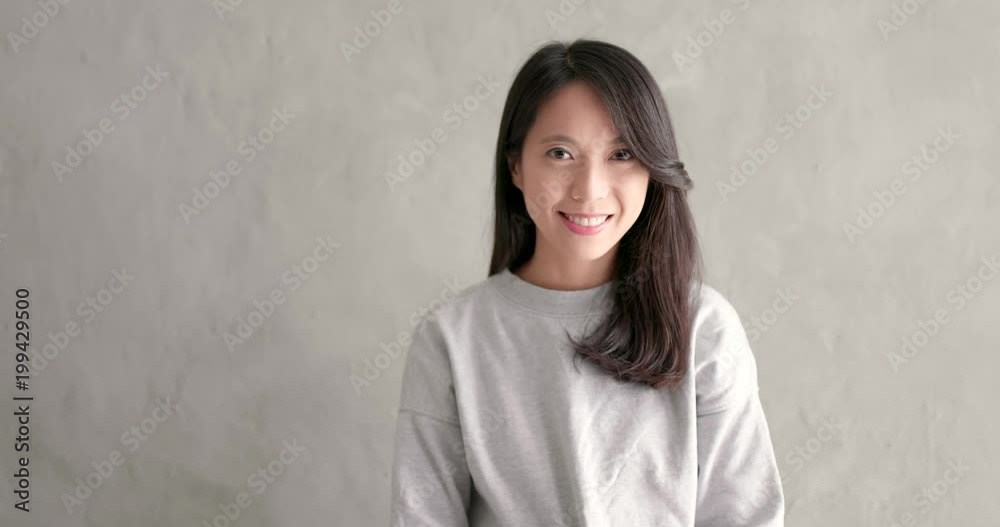 Asian young woman smile to camera Asian young woman smile to camera