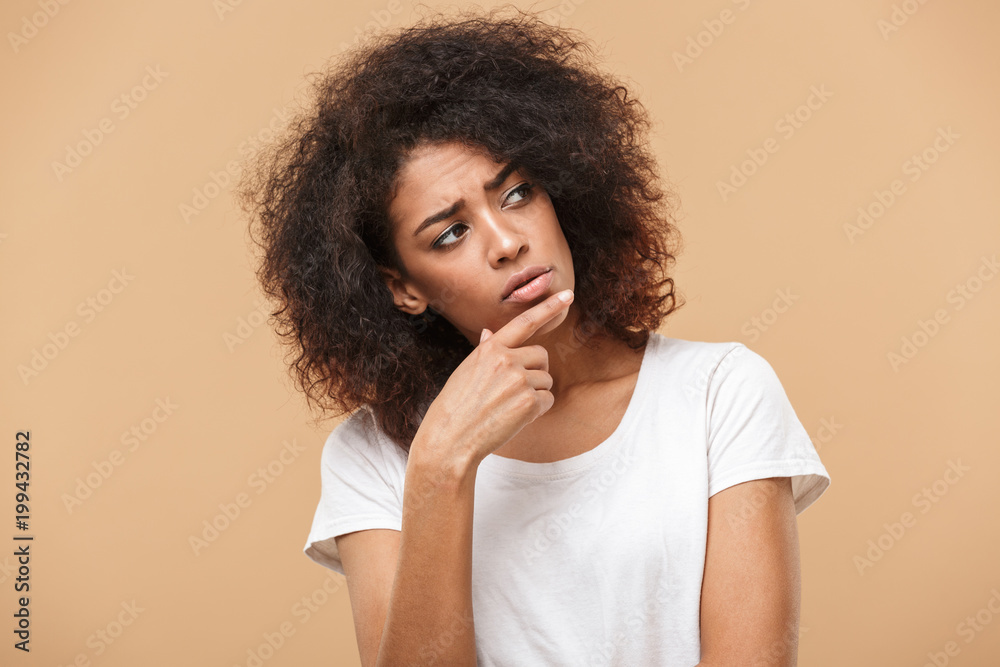 Portrait of a pensive young african woman Portrait of a pensive young african woman