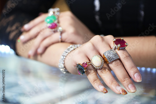 Jewellery and gem stone ring on women hand