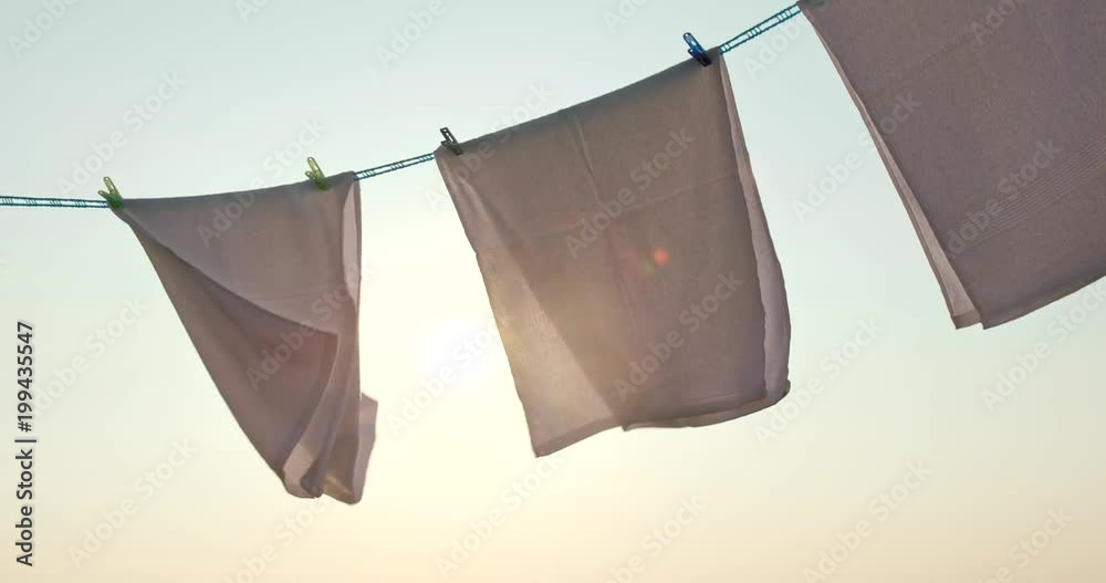 Dry the laundry at outdoor in the sunset time