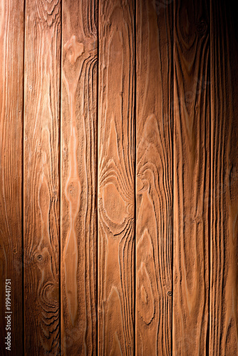 Wooden fence planks background painted in brown