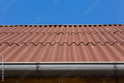 Modern slate roof of the rural wooden house