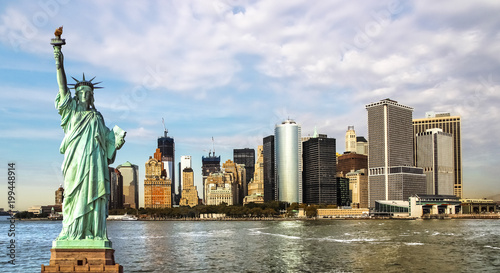 Statue of Liberty and Manhattan Cityscape in Background © Stefan