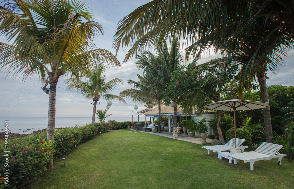 Beautiful view from garden to the beach Beautiful view from garden to the beach