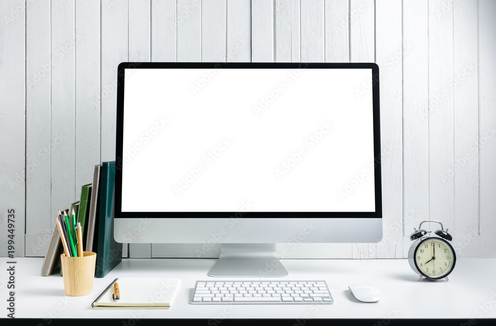 workplace background with Blank white screen modern desktop computer. White wooden vintage blackground workplace background with Blank white screen modern desktop computer. White wooden vintage blackground