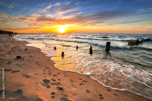 Fototapeta Naklejka Na Ścianę i Meble -  Sunset ovet the Baltic sea beach in Poland