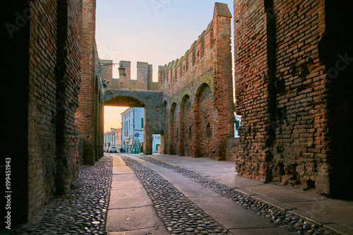 Bild auf Leinwand Montagnana, Italy - August 25, 2017: West Gate The fortress wall of the city in the evening
