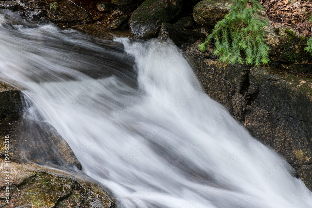 Waterfall from snow melt in the mountains of Madrid, Spain Waterfall from snow melt in the mountains of Madrid, Spain