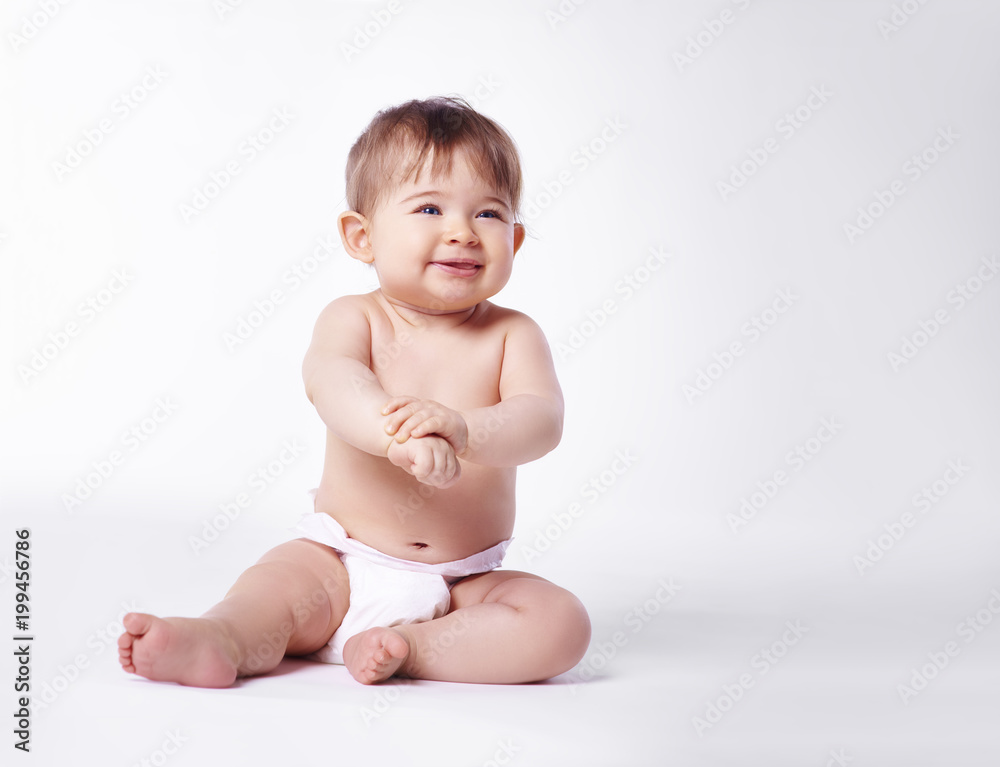 Baby sitting with diaper at studio shot Baby sitting with diaper at studio shot
