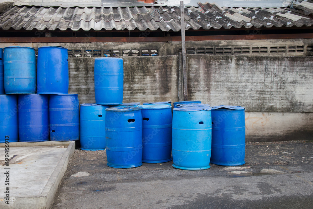 Plastic tanks or 200 liter plastic tank used as trash in a community area. Plastic tanks or 200 liter plastic tank used as trash in a community area.
