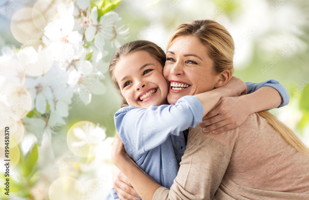 people and family concept - happy smiling mother hugging daughter over cherry blossom background - obrazy, fototapety, plakaty 