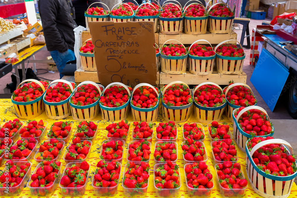 stall with whites with strawberries, provence, spring