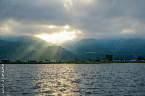 Crepuscular Rays. Sun Shining Through Clouds at Inle Lake in Myanmar (Burma)