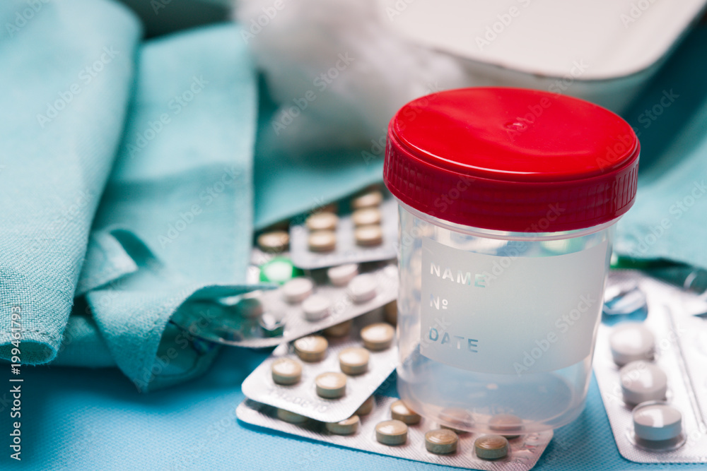 Plastic container, drugs and cotton wool Plastic container, drugs and cotton wool
