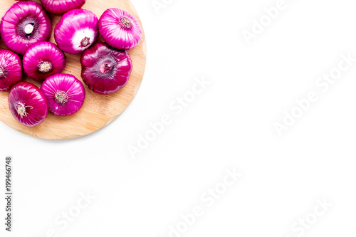 Red onion for salads on white background top view copy space