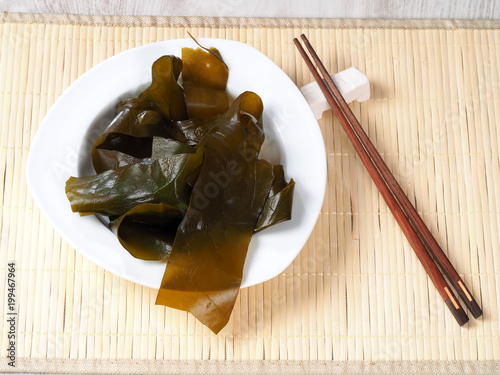 Kombu Kelp - Alga Kombu

Kombu kelp is a large brown algae seaweed. Binomial name: Laminaria Ochroleuca. It is an edible seaweed used extensively in Japanese cuisine. photo