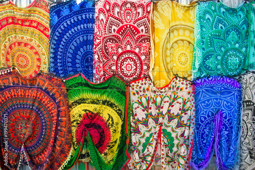 Colourful multicolored Arabian, Turkish, oriental traditional babushka shawls, rugs, kerchiefs