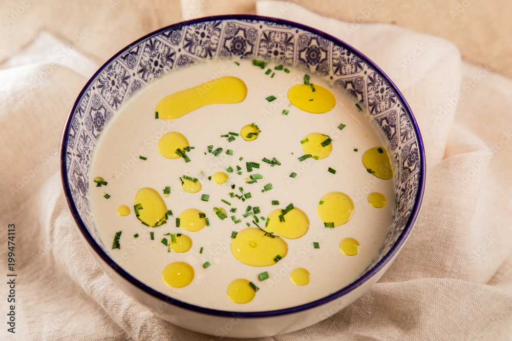Soup with oil on table Soup with oil on table