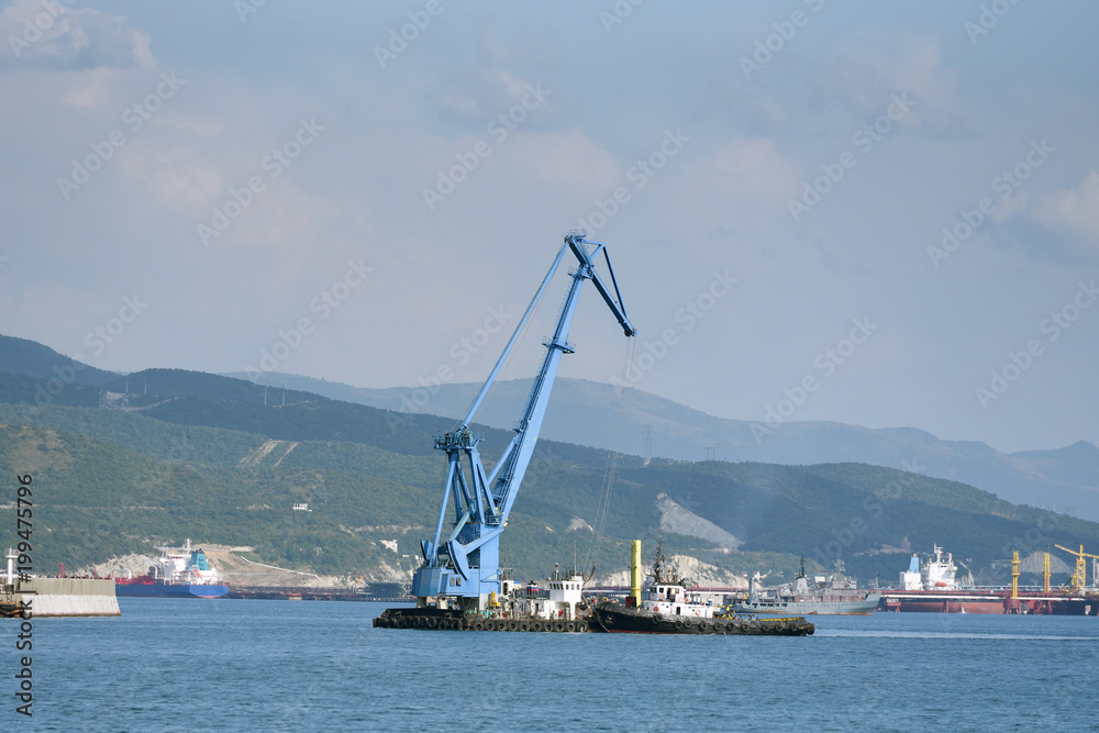 A special crane is installed in the sea for loading or unloading goods from the ship