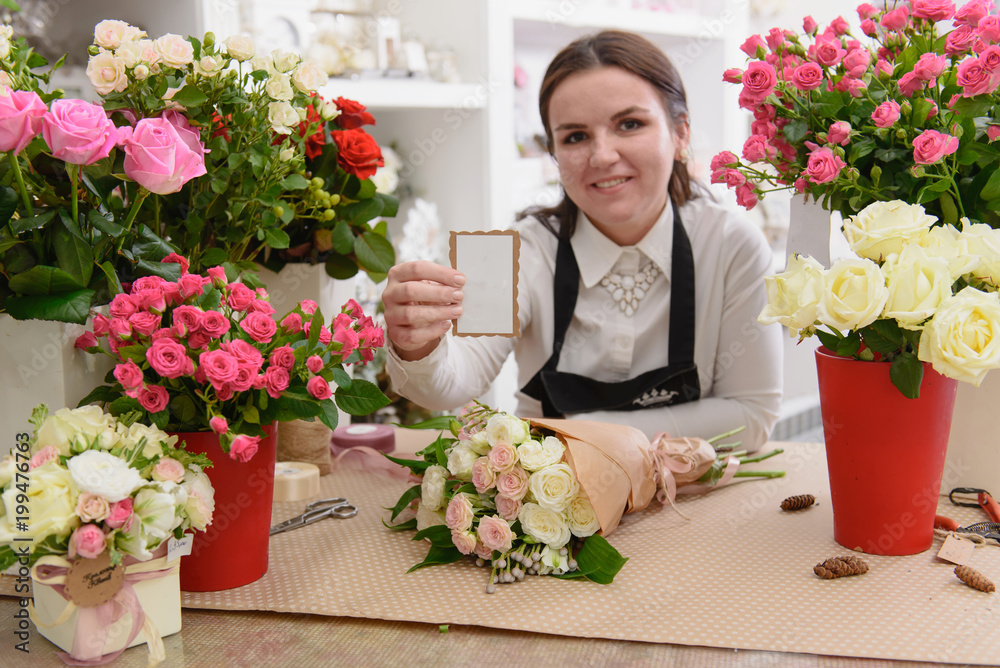Portrait of smiling florist or store owner