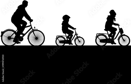 Father and children on a bike.