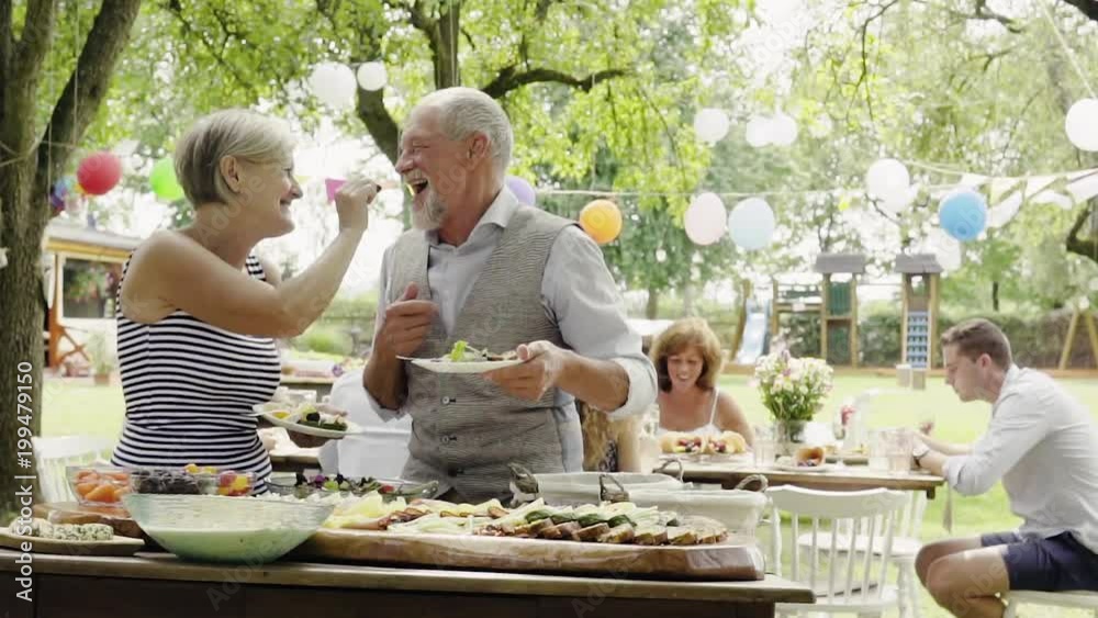 Family celebration or a garden party outside in the backyard.