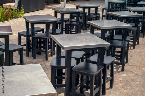 tables and empty chairs at the coffee shop