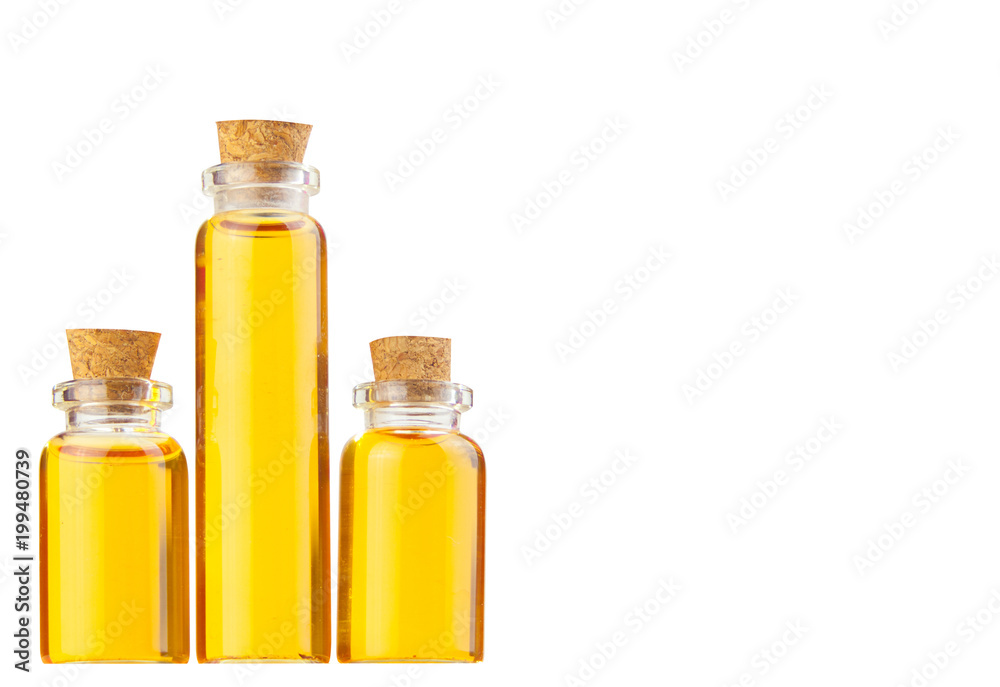 Essence of flowers on table in beautiful glass Bottle Essence of flowers on table in beautiful glass Bottle