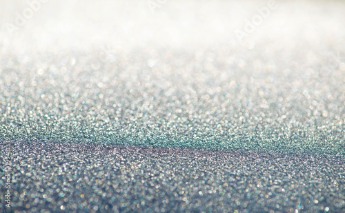 Glitter background with blue and pink streaks
