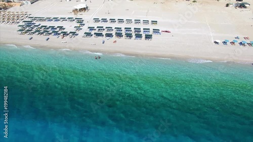 People swimming at beach in Albania photo