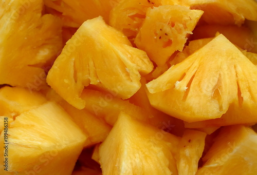 Sliced fresh ripe sweet pineapple background top view