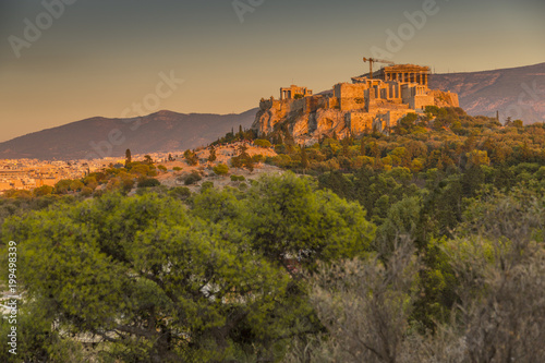 View of The Acropolis, at sunset from Filopappou Hill, Athens, Greece photo