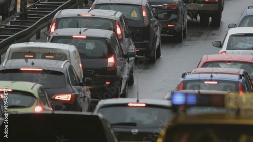 Vehicles Stuck in a Traffic Jam. Police Car