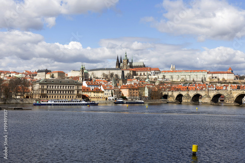 Early Spring Prague gothic Castle with the Lesser Town above River Vltava in the sunny Day, Czech Republic