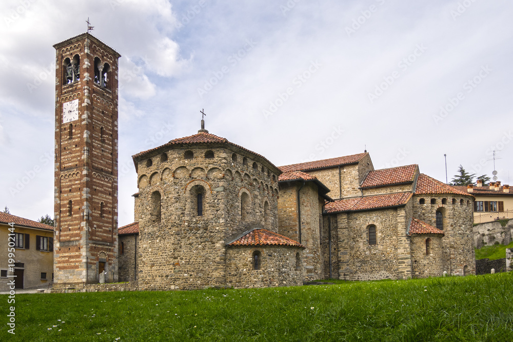 Agliate - Carate Brianza (Italy) - Romanesque Basilica of Saints Peter and Paul and adjacent Baptistery, built shortly after the year 1000.