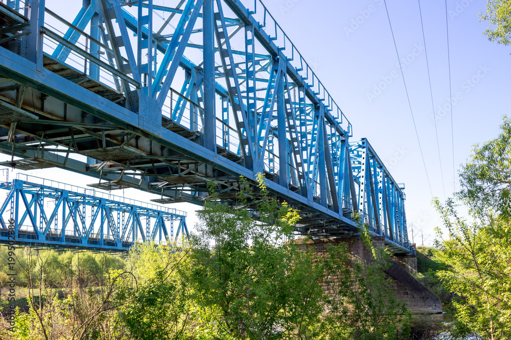 Fototapeta premium Construction of a metal railway bridge 