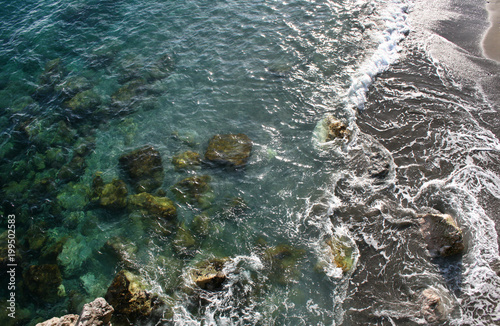 Background texture of the clear blue water of the mediterranean sea