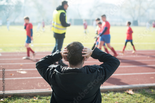 Supporter Man Watching Football Game Outdoors Sitting